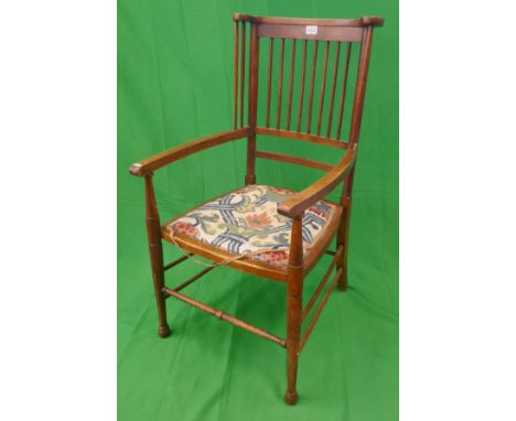 Antique stick back armchair