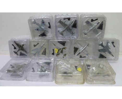 Twelve die-cast model aeroplanes in bubble packs