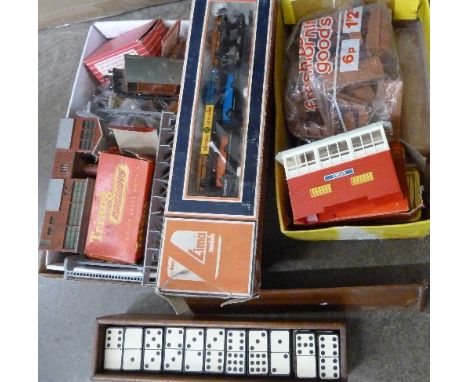 A Lima N gauge locomotive with rolling stock, a Lima car transporter, model rail accessories and a set of dominoes, boxed