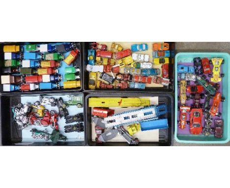A collection of die-cast model vehicles, playworn