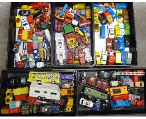 A collection of die-cast model vehicles, playworn