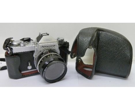 A Nikkormat camera with 50mm, 1:2, 3288616 lens