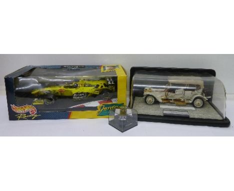 A Hot Wheels Racing, Jordan Mugen Honda Damon Hill Formula One racing car, boxed and a 1911 Rolls Royce tourer model vehicle,