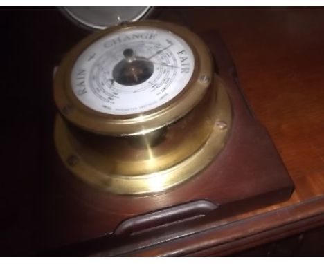 Oak cased mantle barometer by S.B. together with wall hanging barometer