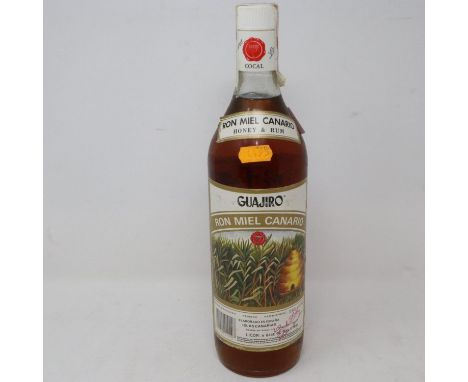 Bottle of Ron Miel Canario honey and rum. UK P&amp;P Group 2 (£20+VAT for the first lot and £4+VAT for subsequent lots) 