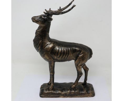 Bronzed cast iron stag on plinth H: 40 cm. UK P&amp;P Group 2 (£20+VAT for the first lot and £4+VAT for subsequent lots) 