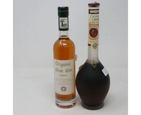 Half litre bottle of organic sloe gin and a half litre bottle of Cacao Crema. UK P&amp;P Group 2 (£20+VAT for the first lot a