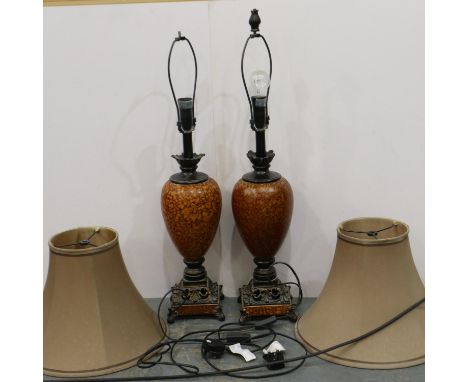 Pair of metal framed and ceramic table lamps with shades, lacking one finial. All electrical items in this lot have been PAT 