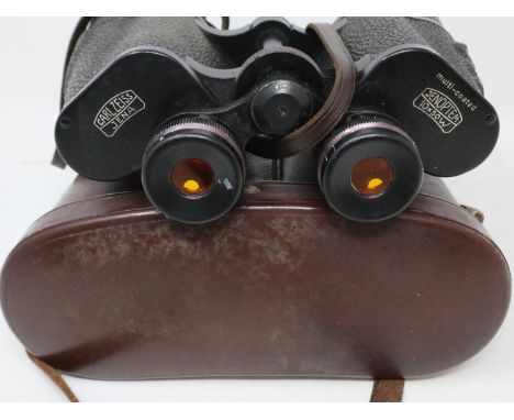 Pair of Carl Zeiss Jena Jenoptem 10 x 50 binoculars, cased. Case damaged. UK P&amp;P Group 2 (£20+VAT for the first lot and £