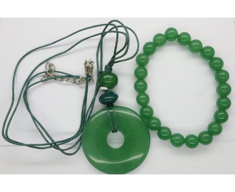 Jade pendant necklace and a jade beaded bangle, largest L: 46 cm. UK P&amp;P Group 0 (£6+VAT for the first lot and £1+VAT for