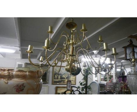 A large brass ceiling light.