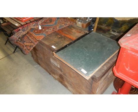 A late 19th century zinc lined wooden trunk with label inside lid 'W.J.Lovelace & Son.,'