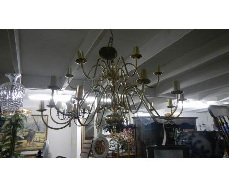 A large brass ceiling light.