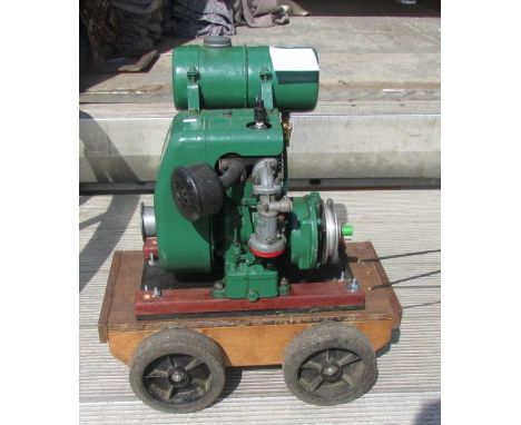 A stationery petrol engine.