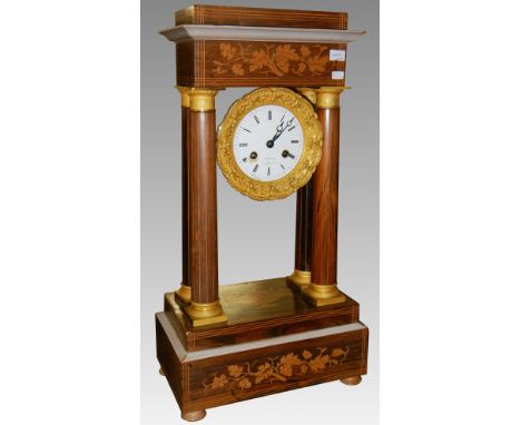 A French inlaid clock on stand.