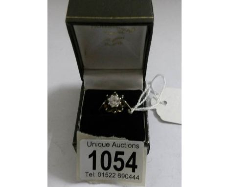 A 9ct gold cluster ring, size R.