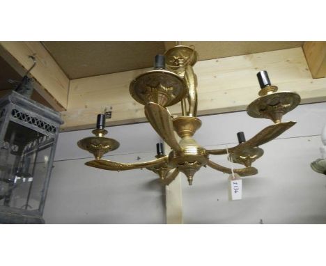 An ol 5 lamp gilded ceiling light.