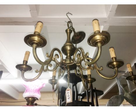A 6 lamp brass ceiling light.