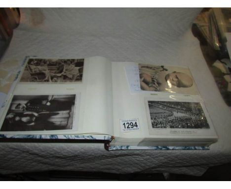 An album of in excess of 140 postcards including humour, royalty, art etc.,