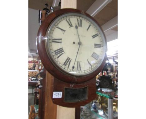 An old chain driven wall clock by Richard Hardy, Newark, (hinge on door needs attention).