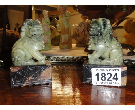 A pair of Jade dogs of fo.