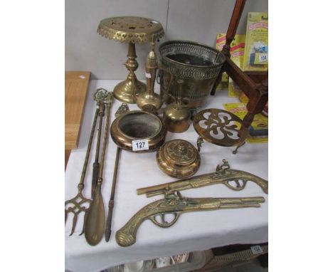 A brass trivet, brass planter, toasting fork etc.,