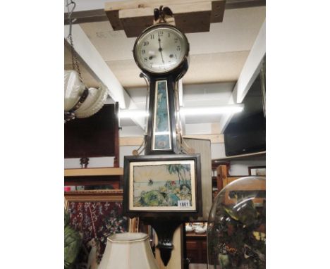An Ingraham USA banjo clock, mechanical 8 day revers wind in American walnut case.