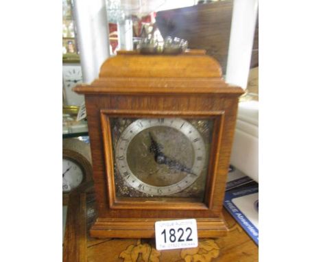 A small bracket style clock.