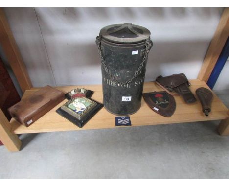 A military vacuum cylinder, a plaque for HMS Pelican and the Lancashire Fusiliers, a cigarette box with Royal Engineers carvi