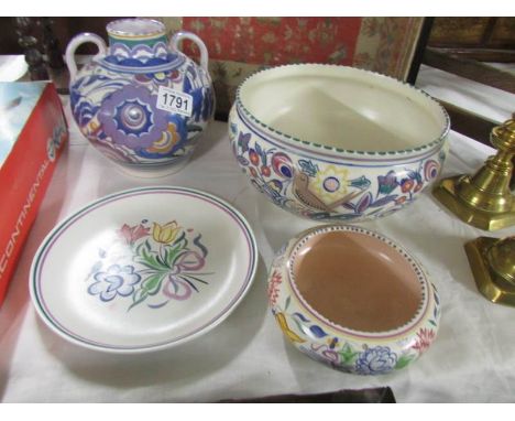 4 items of Poole pottery.
