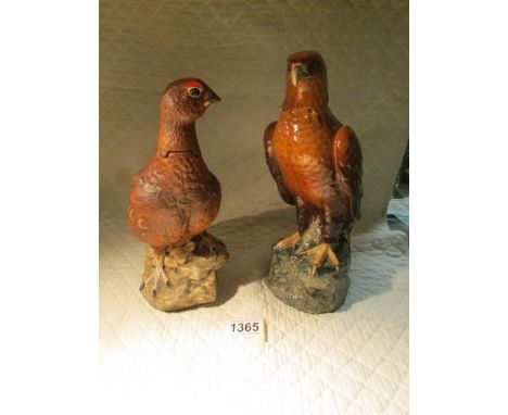 A Whyte and Mackay Golden Eagle decanter together with a Famous Grouse decanter (no contents).