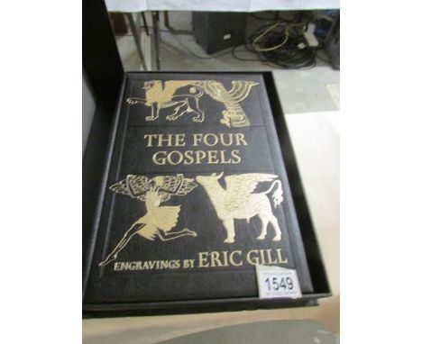 A Folio Society copy of 'The Four Gospels' with engravings by Eric Gill with the smaller book 'The Four Gospels Essays by Joh