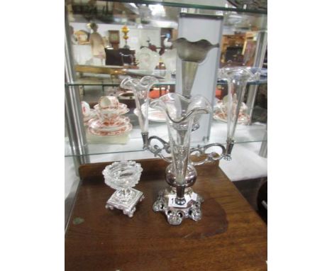 A silver plate and glass epergne and one other item.