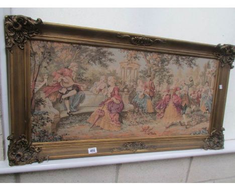 A framed tapestry.