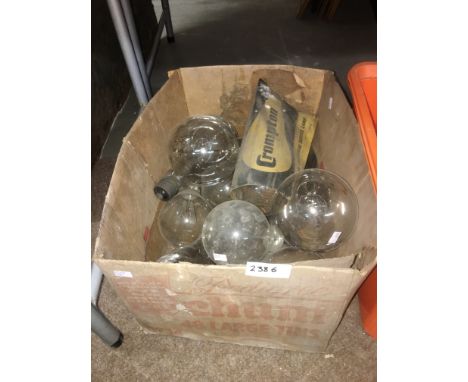 A box of large vintage light bulbs.
