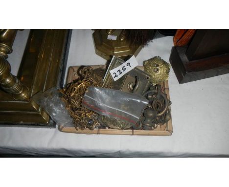 A quantity of old brass lamp chains.