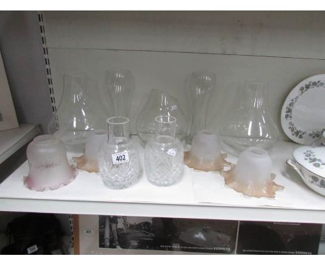 A mixed lot of glass ware including lamp shades.