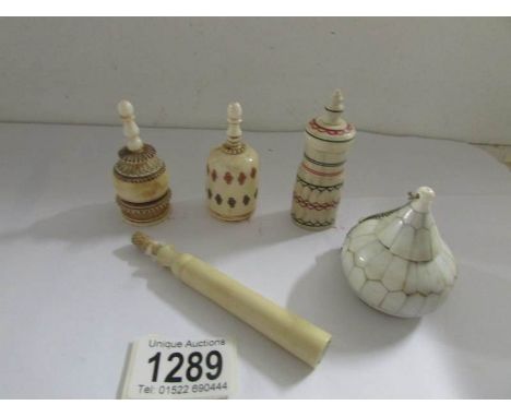 3 19th century ivory scent bottles, an ivory needlecase and one other item.