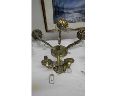 3 heavy brass 3 lamp wall lights.