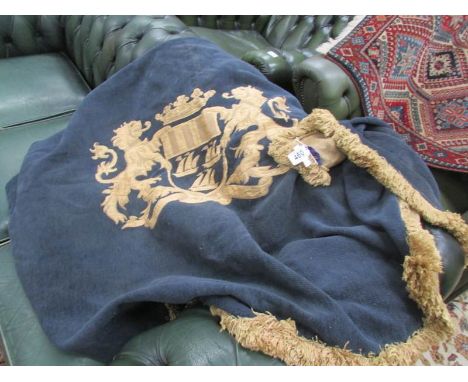 A wall hanging featuring coat of arms, a/f.