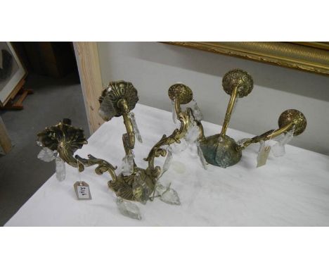 2 heavy brass triple lamp wall lights.