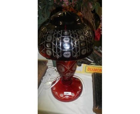 A good quality cut red glass Bohemian table lamp.