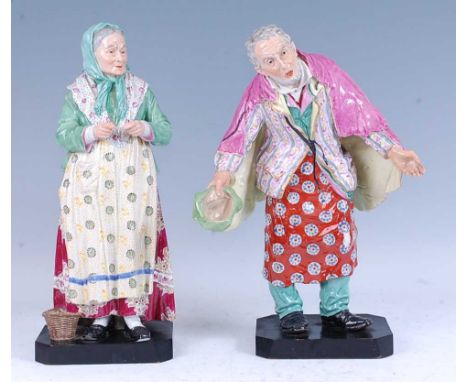 A pair of German porcelain figures, late 19th century, each shown in 18th century dress with enamel decoration and mounted up