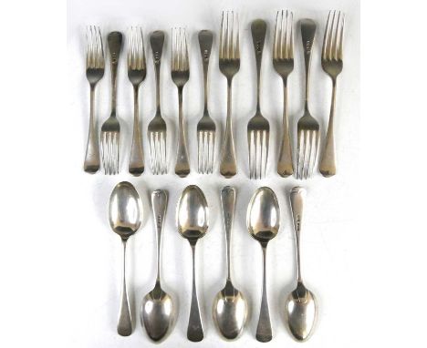 A matched suite of silver flatware, in the Old English pattern comprising five table forks, six dessert forks, and six desser