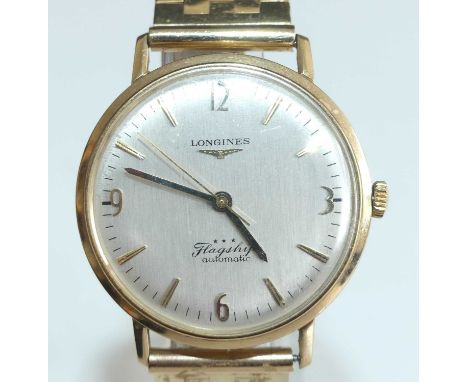 A 9ct yellow gold Longines Flagship automatic wristwatch, having a round silver quarter Arabic dial and non-related 9ct gold 