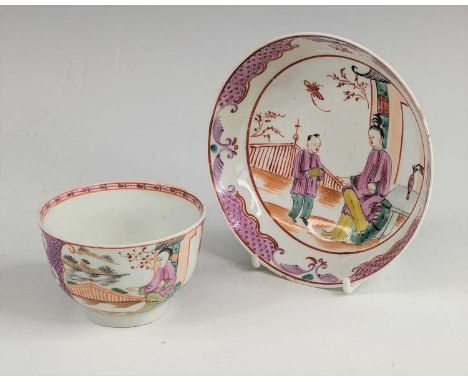 A Lowestoft porcelain tea bowl and saucer, circa 1780, enamel decorated in a variation of the Mandarin pattern, saucer dia.12