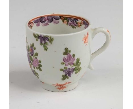 A Lowestoft porcelain coffee can, circa 1790, enamel decorated with floral sprays in the manner of Thomas Curtis, h.6cm