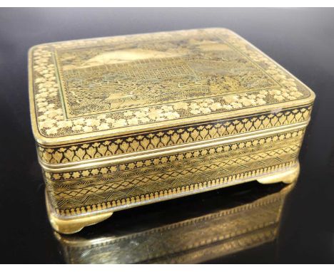 A Japanese Meiji period Komai Company of Kyoto nunome-zogan worked metal trinket box, of rounded rectangular form upon four s