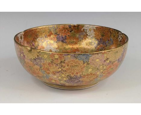A Japanese Satsuma bowl, probably Taisho period, gilt and enamel decorated with flowers, seal mark to the underside, dia.18.5