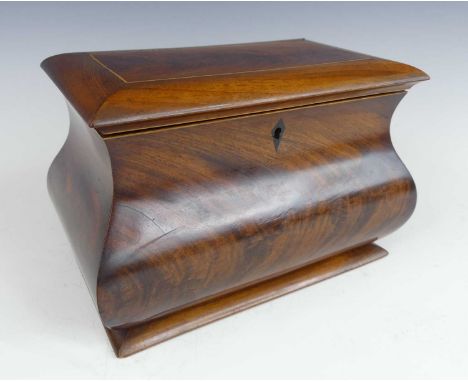 A circa 1830 mahogany tea caddy, of rectangular bombe form, with boxwood stringing, opening to reveal two lidded compartments